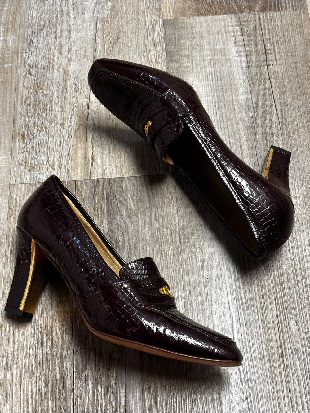 St. John Croc-Embossed Heeled Loafers in Mahogany Brown with Gold Coin Accent